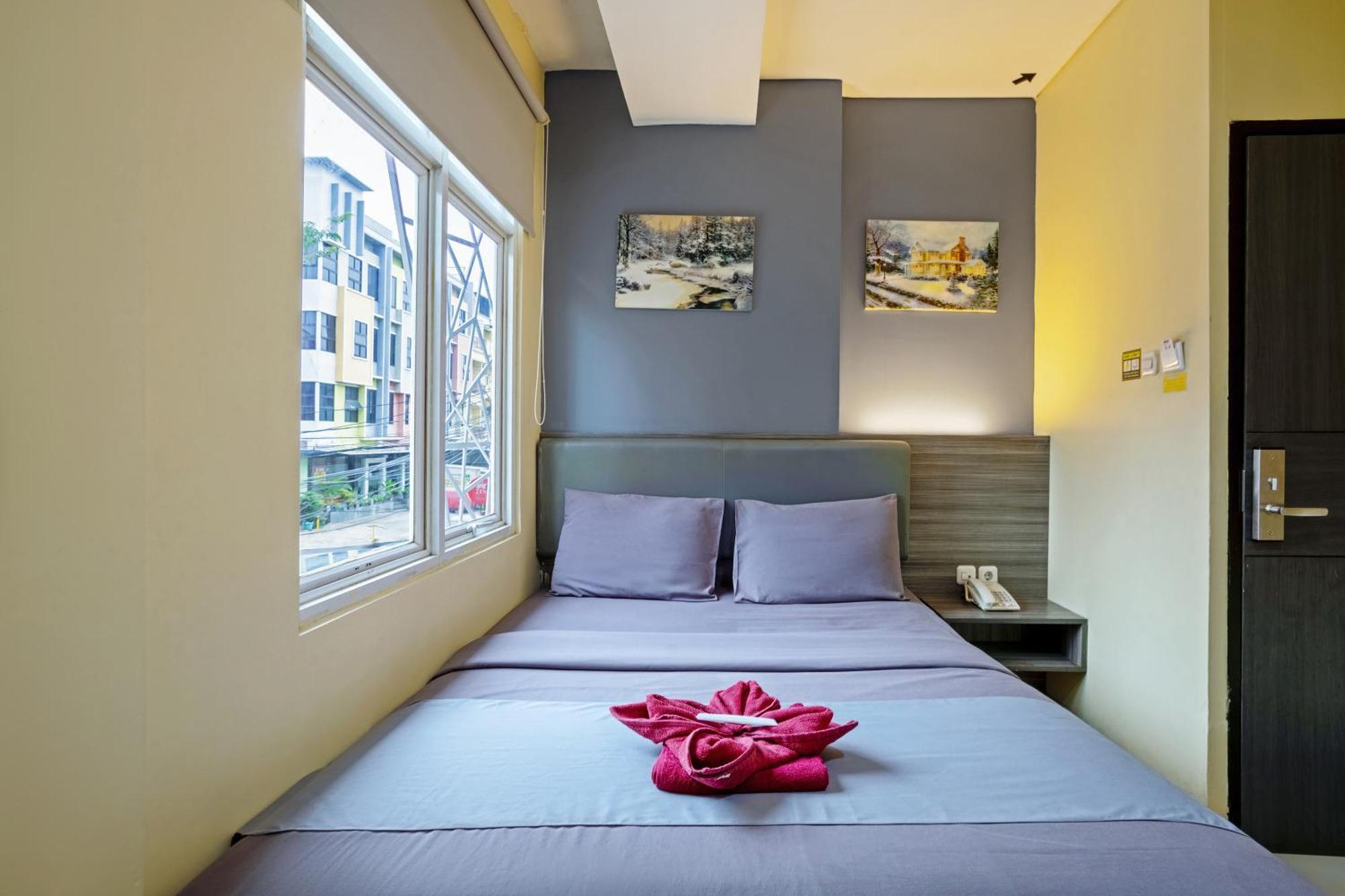 City Biz Residence Jakarta Zimmer foto