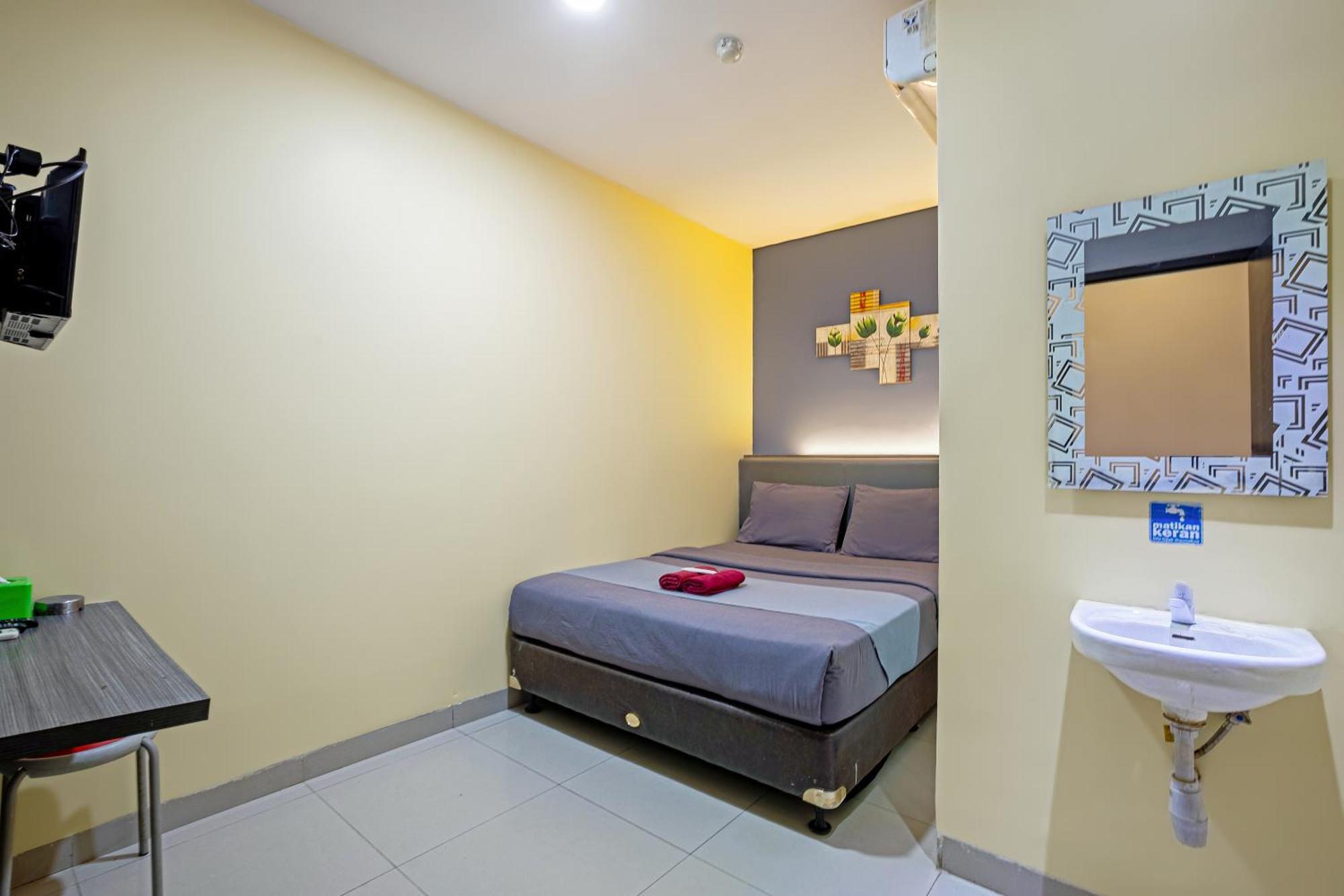 City Biz Residence Jakarta Zimmer foto